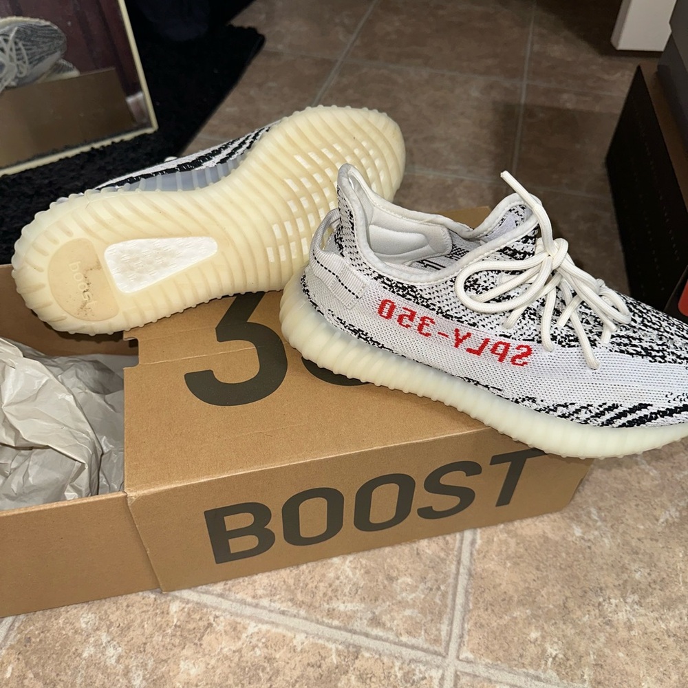 Yeezy Boost 350 V2 in Black, White, and Red